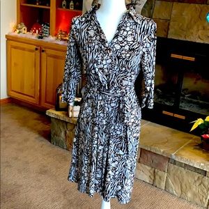 Polyester dress with fun but subtle color print.